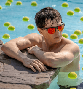 Performance SFIA06 U28R sunglasses model with brown/red colored lenses worn in the pool
